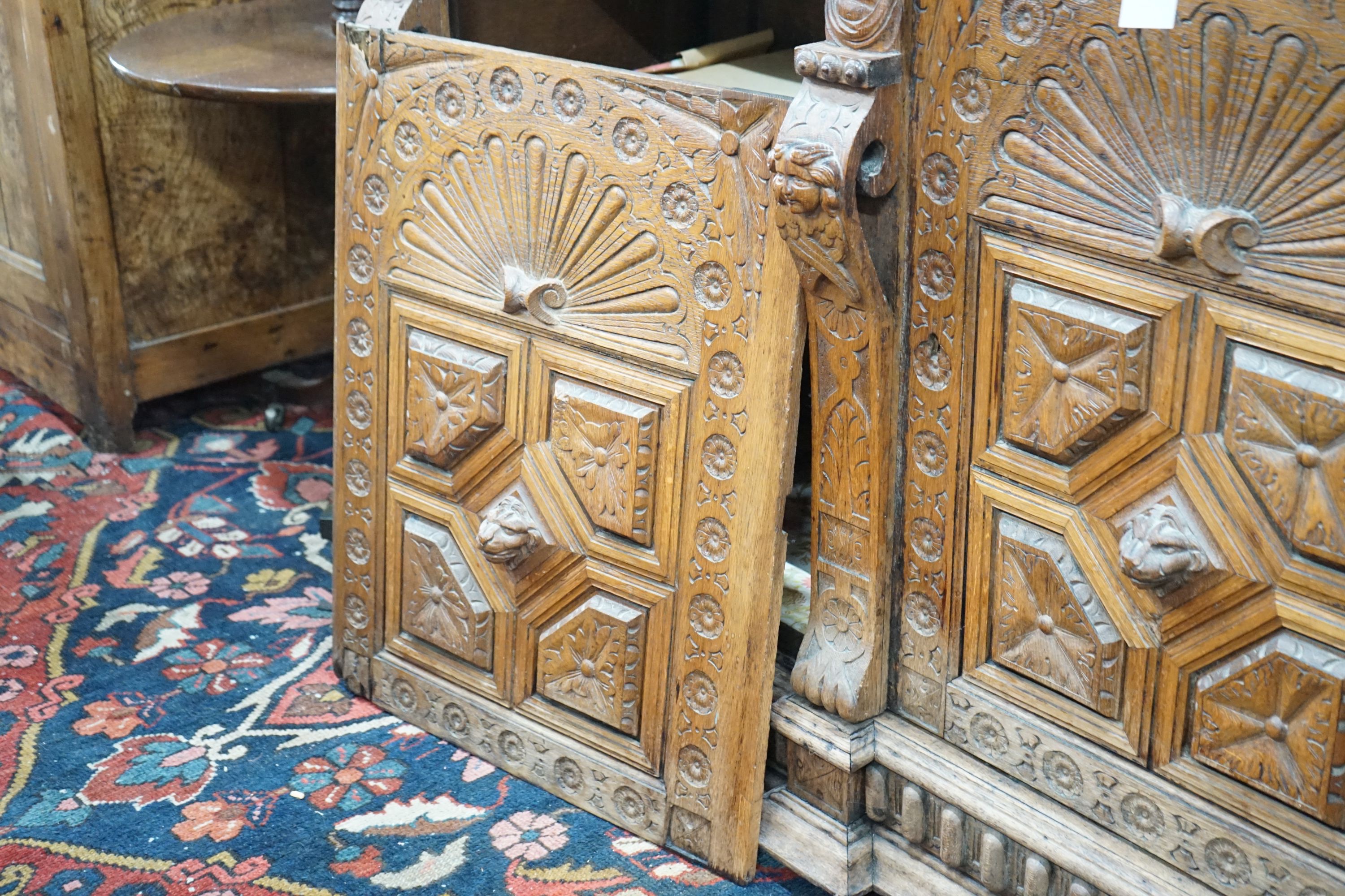 A 19th century Flemish carved oak buffet, length 140cm, depth 55cm, height 110cm